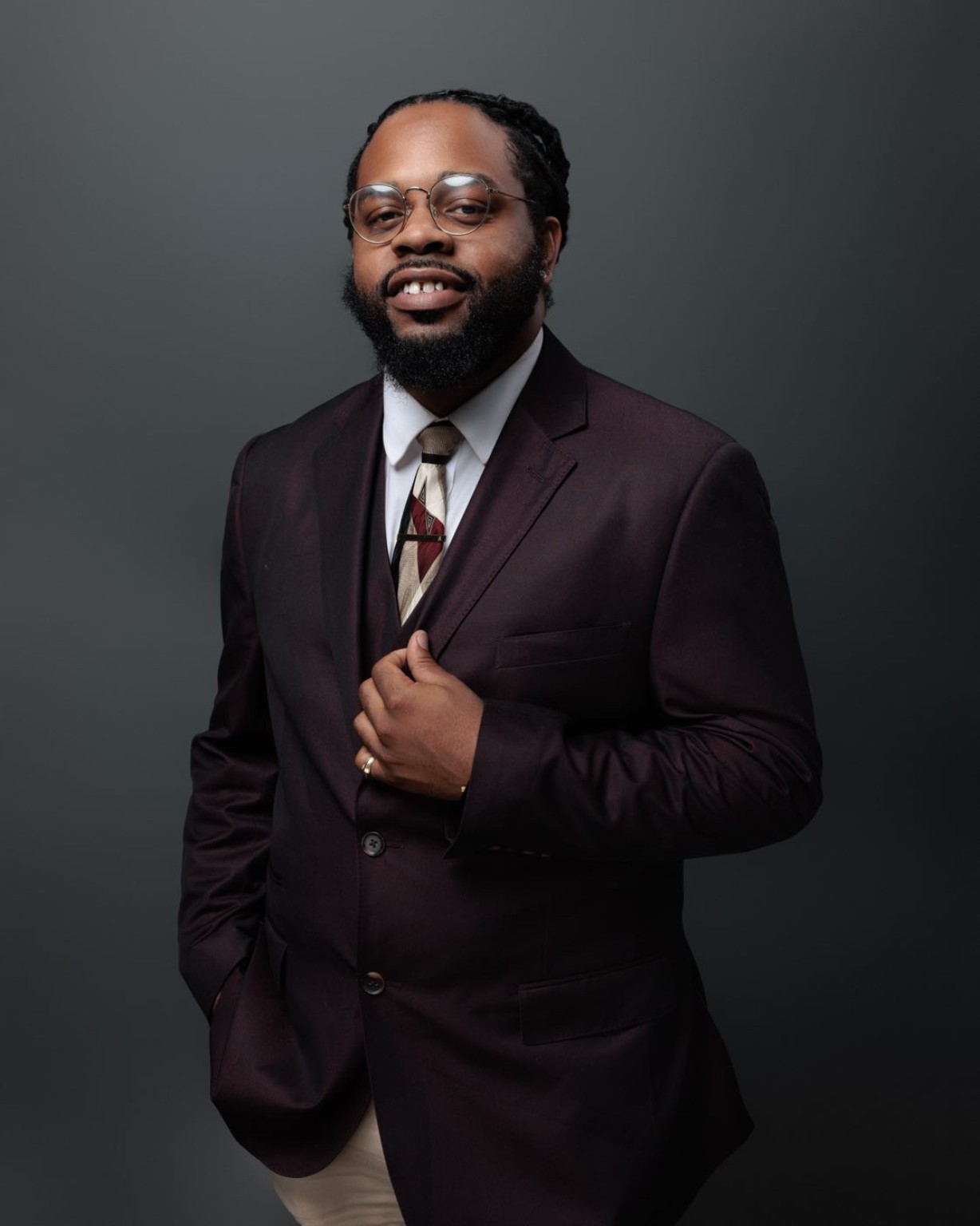 Formal studio portrait of Al Gordon
