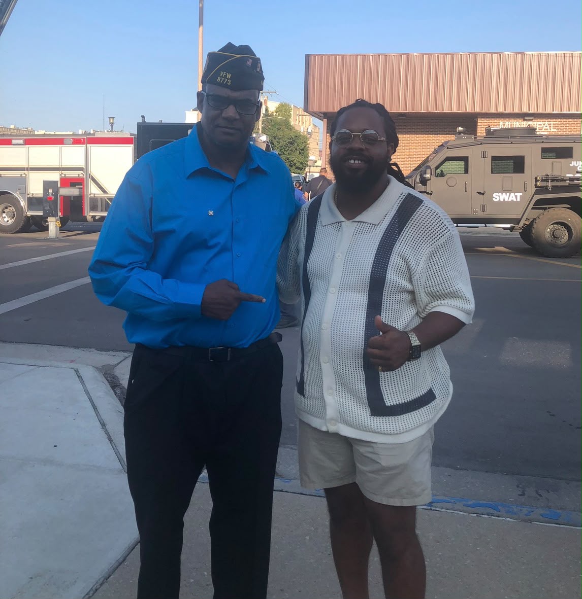 Jamal Benjamin and Treasurer Al Gordon during community service in Junction City
